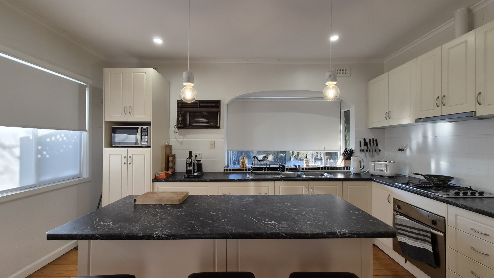 Modern kitchen with stone benchtops and island